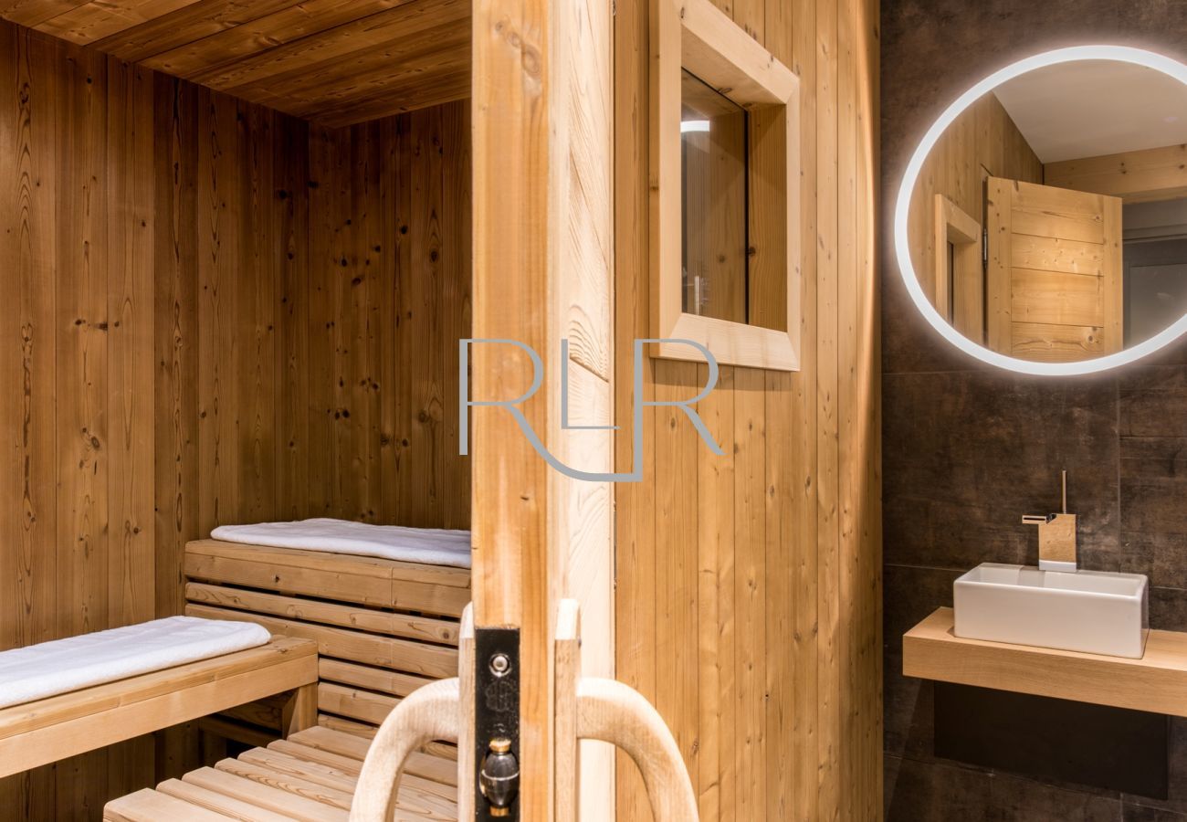 Chalet Seren a un sauna avec une douche adjacente