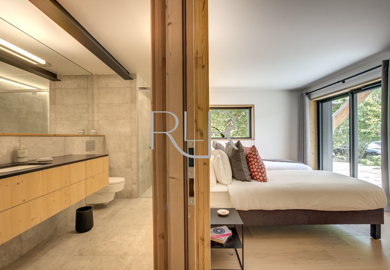 Chambre 4 du Chalet Breitalps est flexible avec un lit double ou deux lits simples