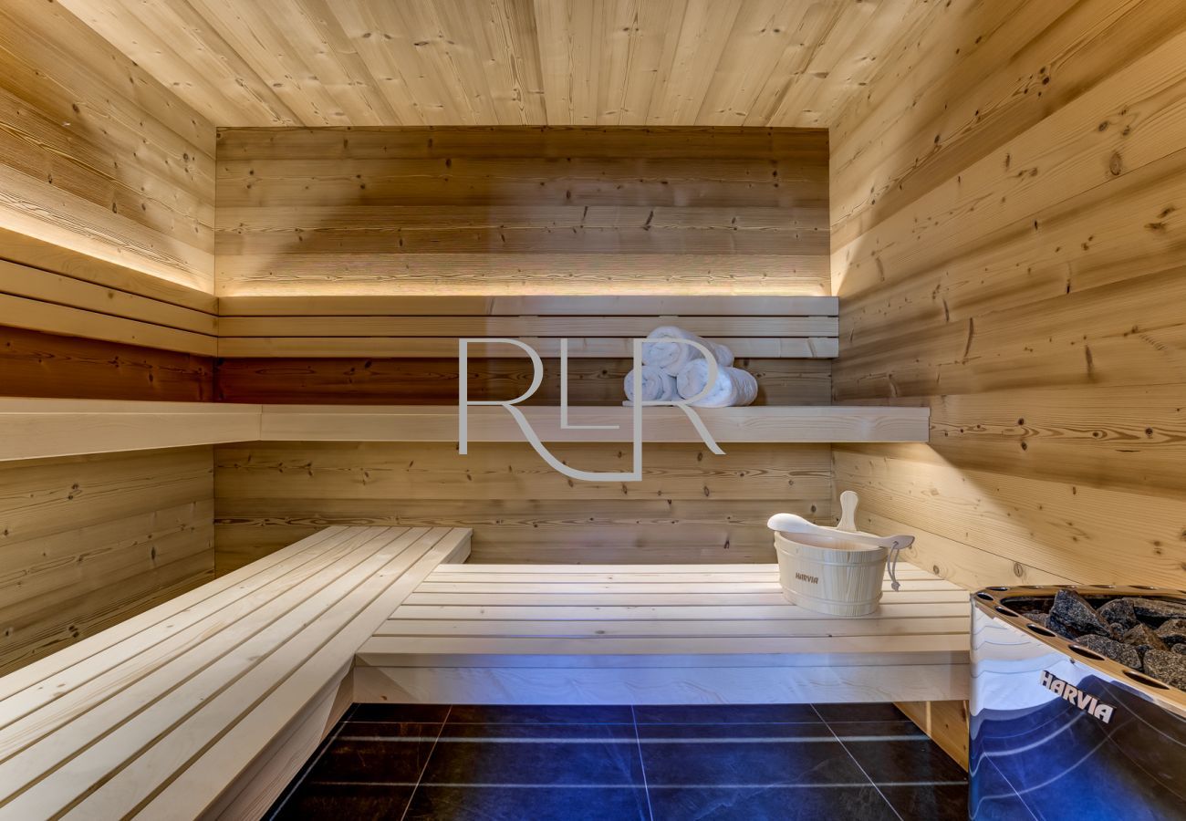 Chalet les Trois Soeurs a un grand sauna intérieur pour la relaxation avec chaleur profonde
