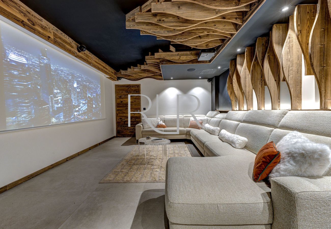 Chalet les Côtés du Lavancher  a une salle de cinéma pour les soirées à la maison.