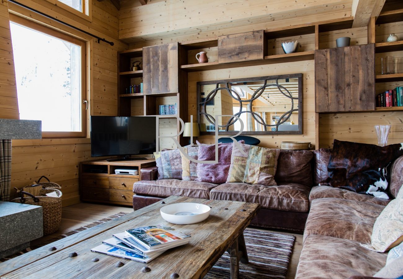 Chalet le Favre has comfortable sofas for relaxing by the fire