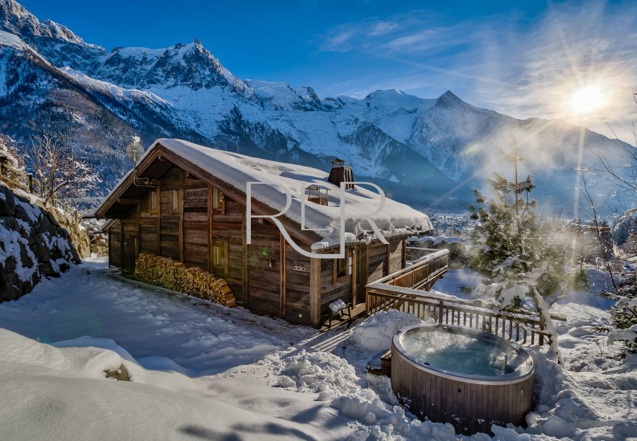 Chalet le Favre's hot tub is accessed from the terrace 
