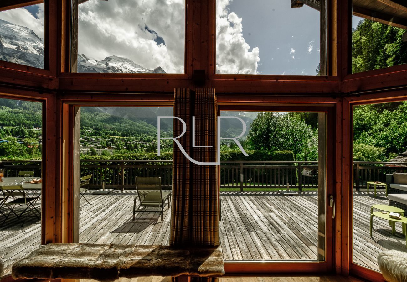 Chalet le Favre has impressive double height and large glass doors onto the terrace