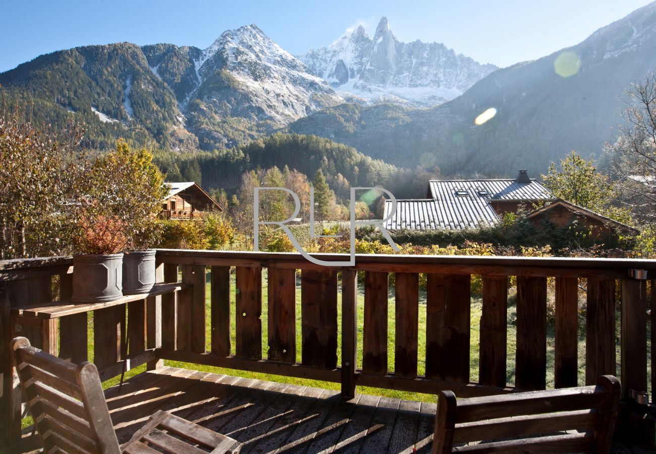 Chalet Amelie has a large balcony off  the living area with outdoor dining furniture and BBQ in summer 