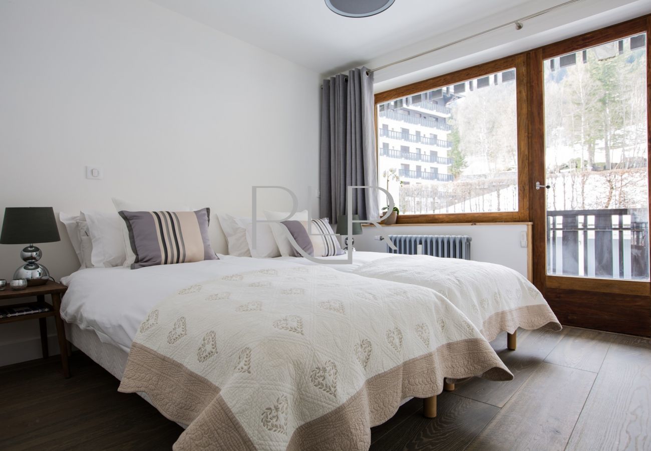 Bedroom 2 of Brevent 3 is a flexible room with an ensuite bathroom and shared balcony