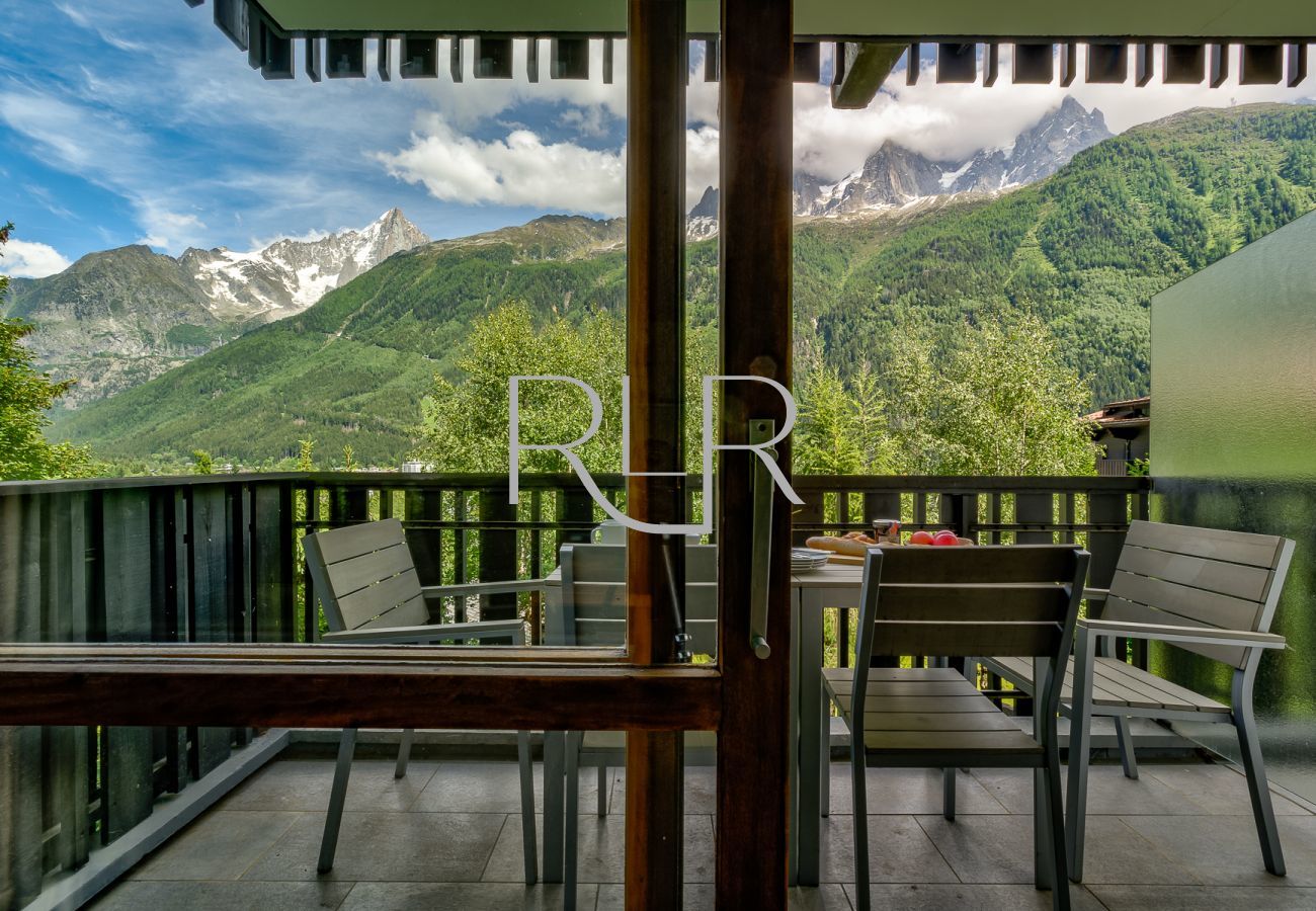 Brevent 3 has a large glass sliding door opening onto the living area balcony 