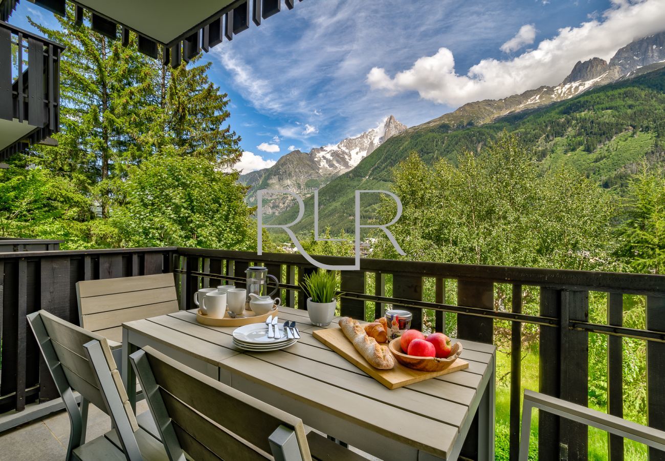 Brevent 3 has a balcony off the living area with outdoor dining furniture