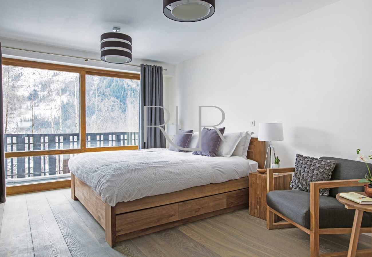 Bedroom 1 of Brevent 3 is a double room with an ensuite and a balcony