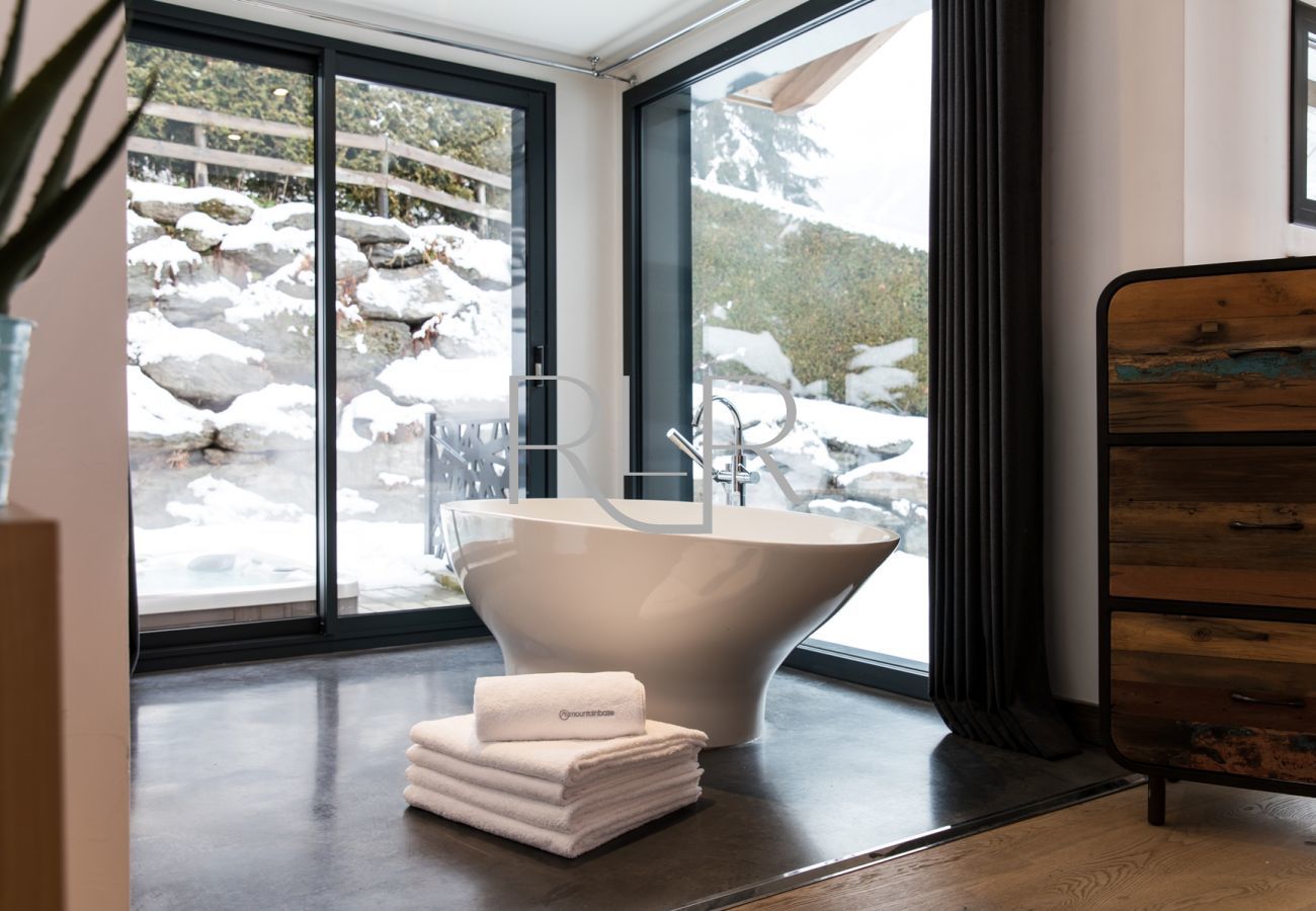 Chalet Belachat has a beautiful free-standing bath in Bedroom 1    