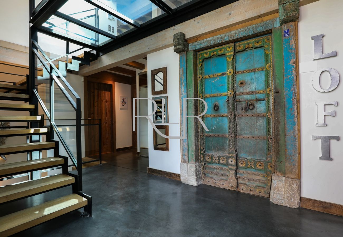 Chalet Belachat has an impressive entrance with doors leading to the master suite  