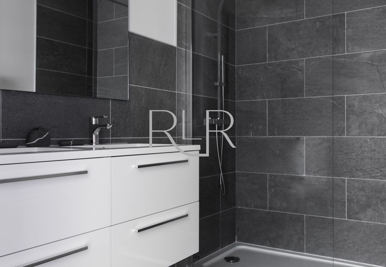 Chamois 2 has a shower room with twin basins and a separate WC