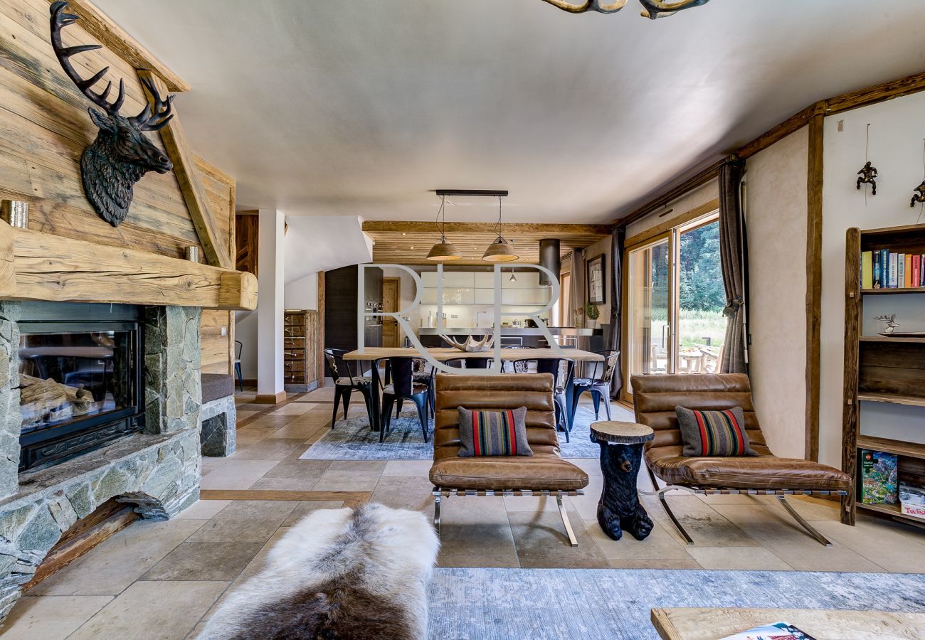 Chalet Sanaz has an open plan living area with a log burner       