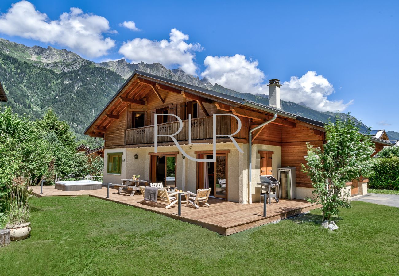 Chalet Sanaz has a large deck with outdoor furniture and BBQ