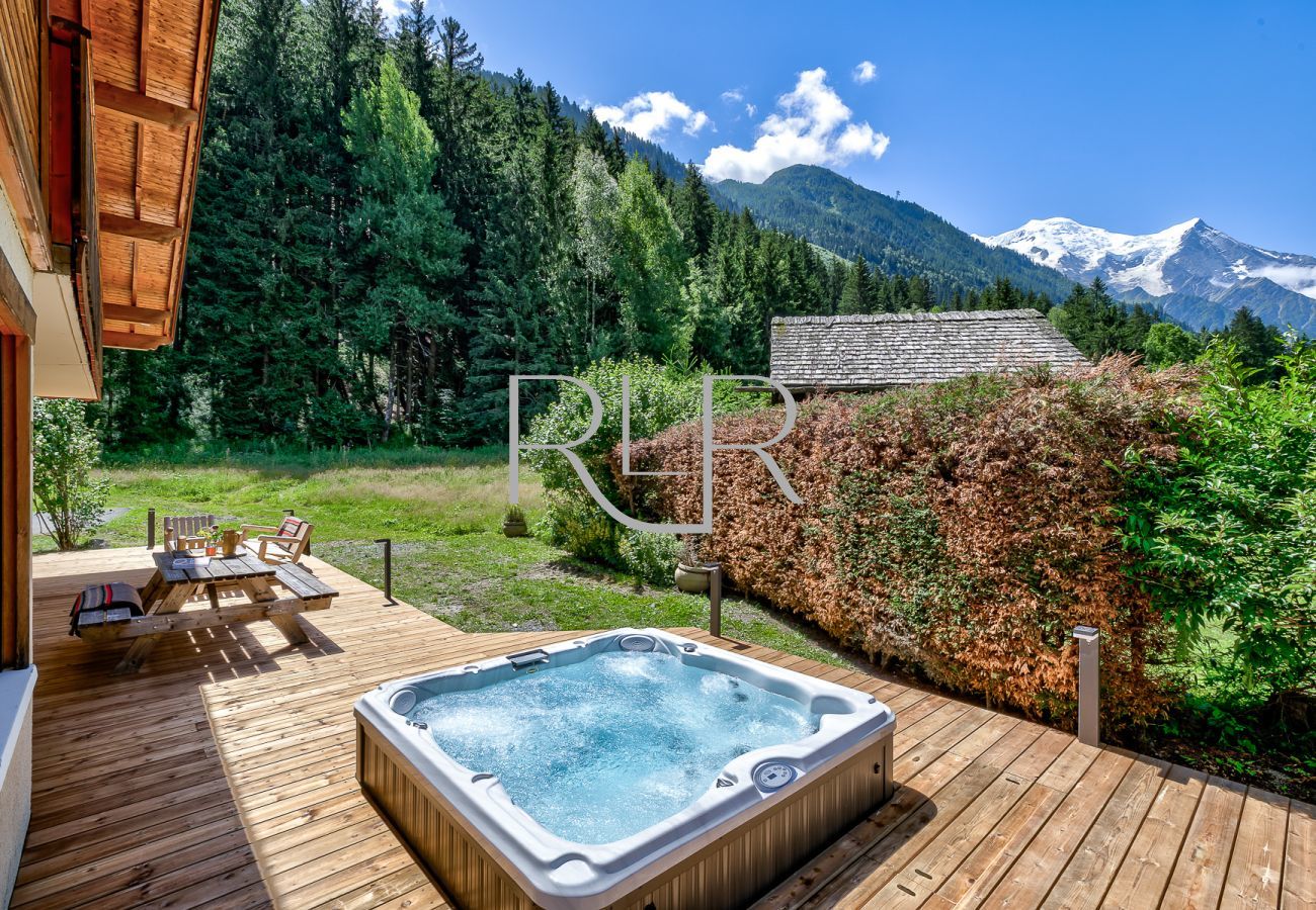 Chalet Sanaz has a sunken hot tub which is a great place to relax summer or winter