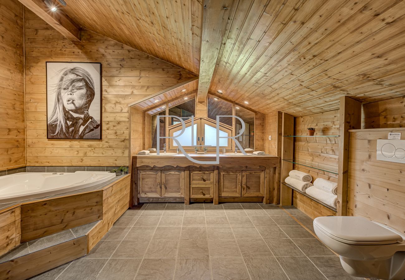 Chalet Sanaz has an impressive ensuite to Bedroom 1 with a corner bath 