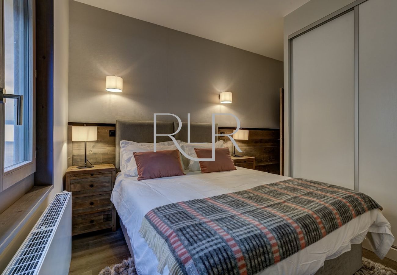 Bedroom 1 of White Pearl C12 has large built-in wardrobes