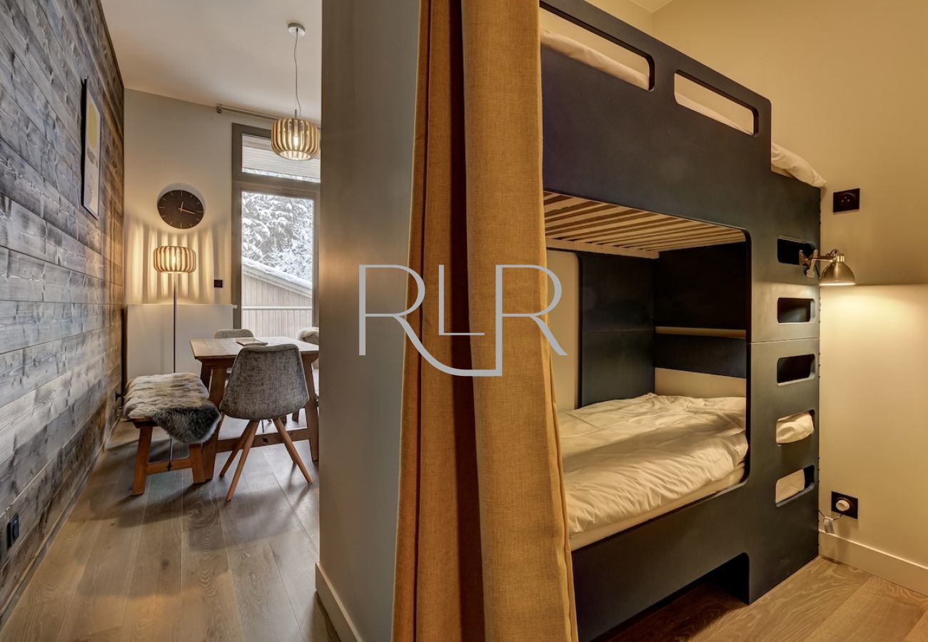 White Pearl C12 has child-size bunk beds off the hallway 