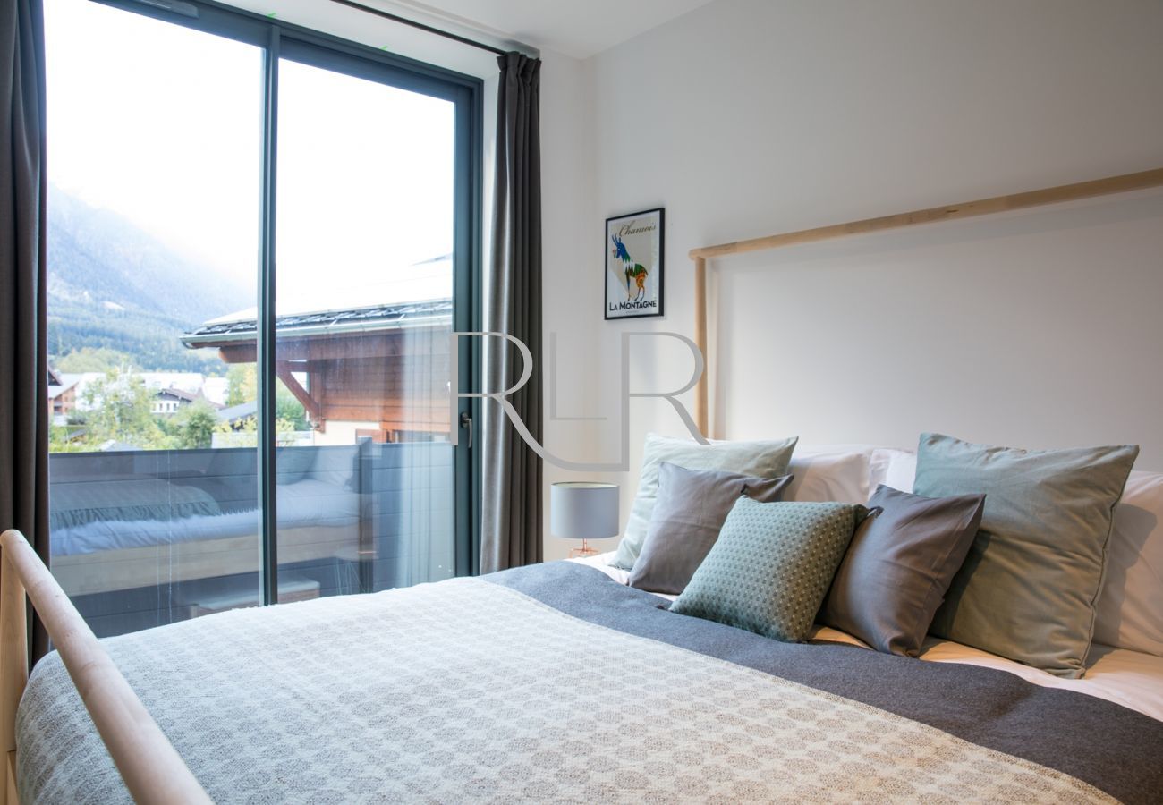Chamois 3's Bedroom 1 is a double room which has doors onto the terrace