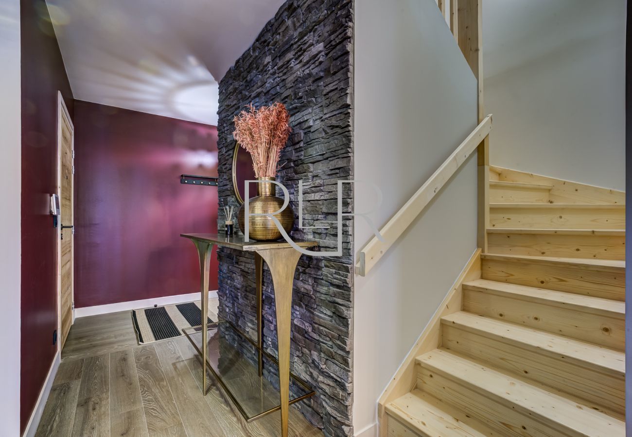 White Pearl A31 has a hallway leading to Bedrooms 1 & 2 and stairs to Bedrooms 3 & 4