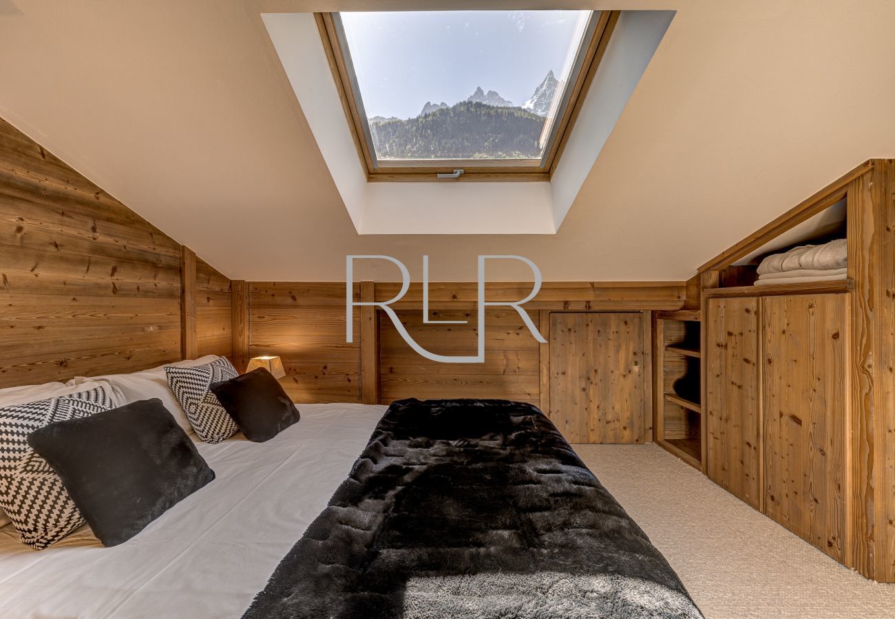 Beautiful mountain views from this bedroom with ensuite in Chalet les Sauberands