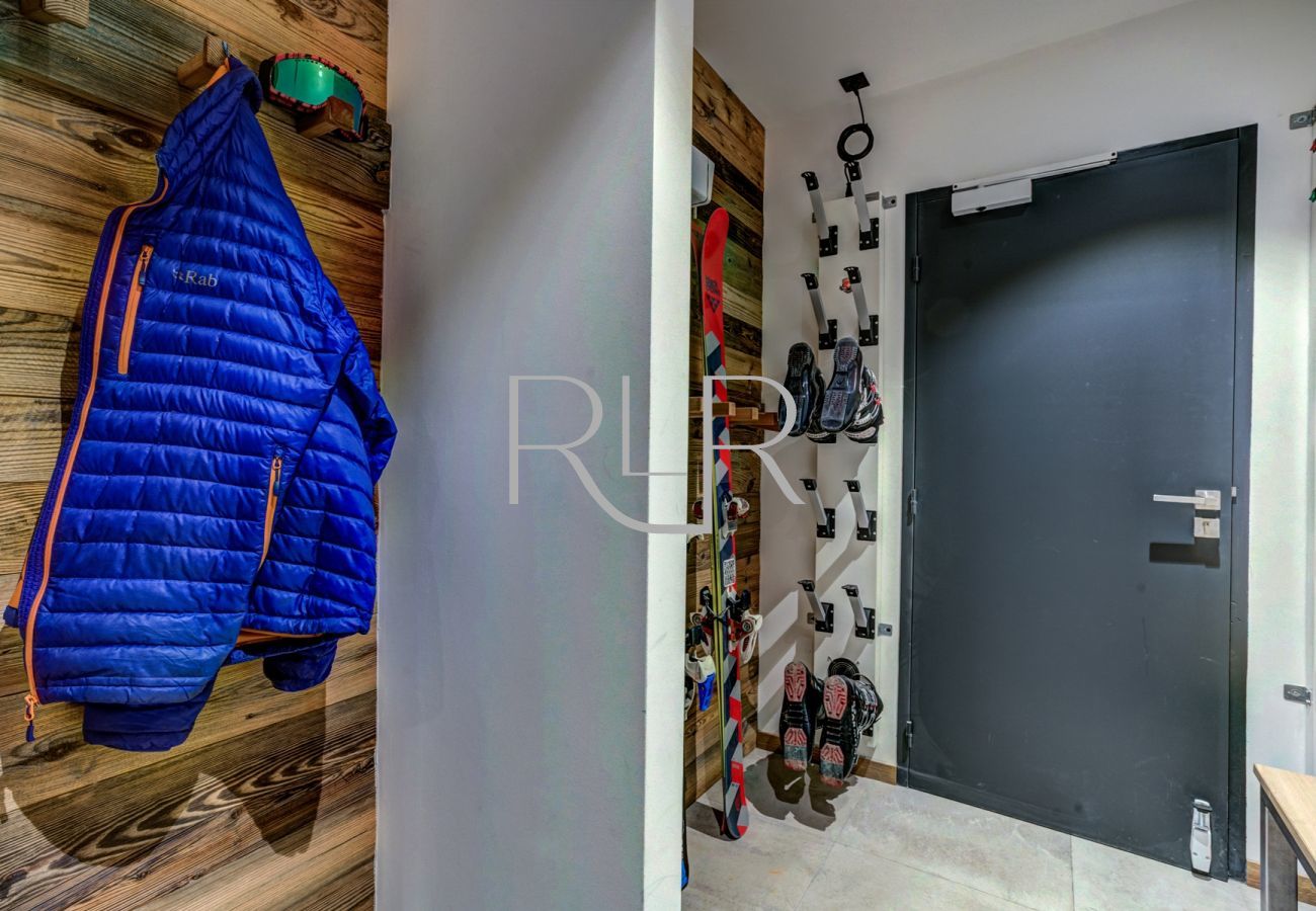Chalet Red Fox has a ski room with heated boot dryers