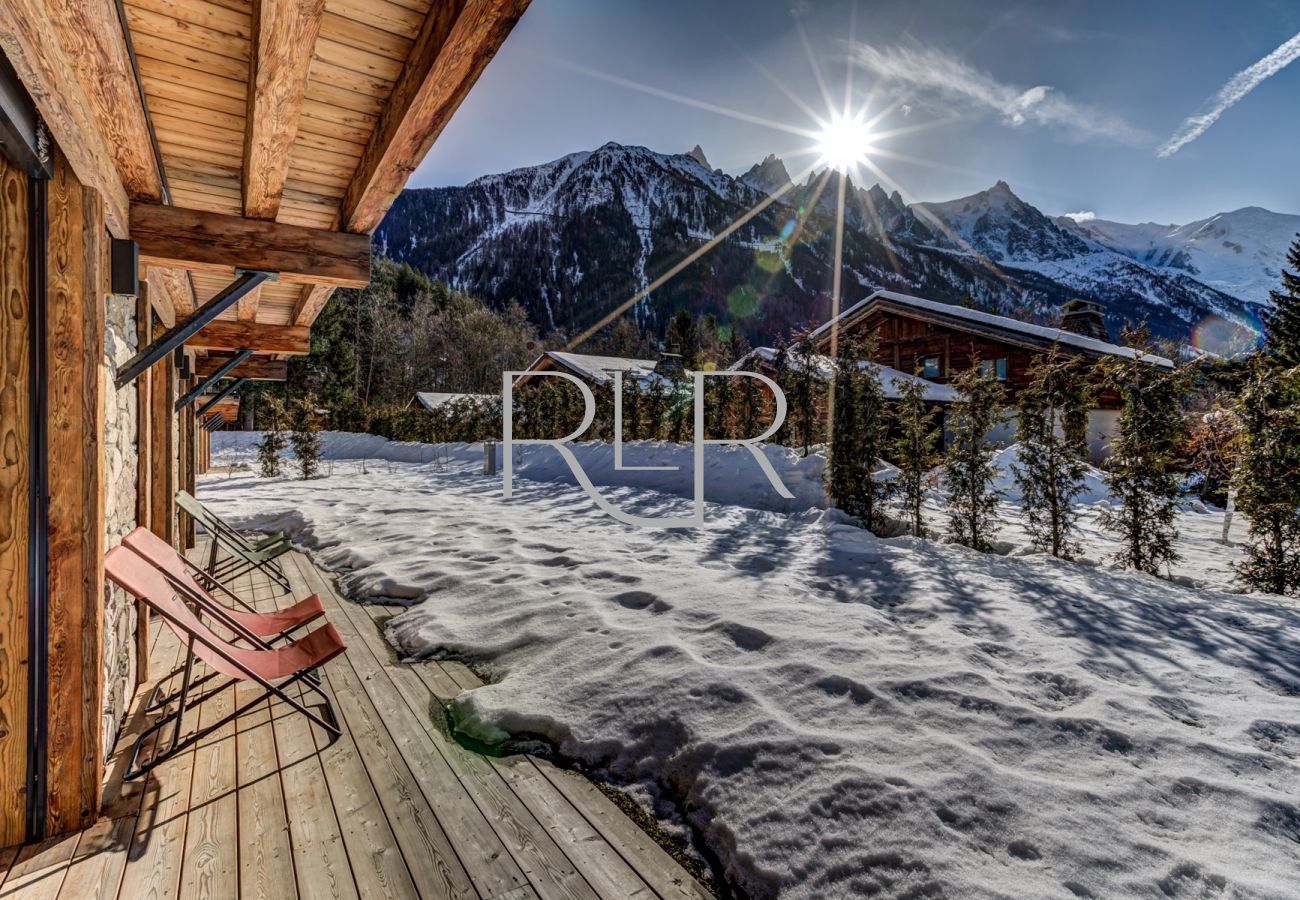 Bedroom 2, 3 & 4 at Red Fox open on to the deck and garden with beautiful views of the Mont Blanc Massif