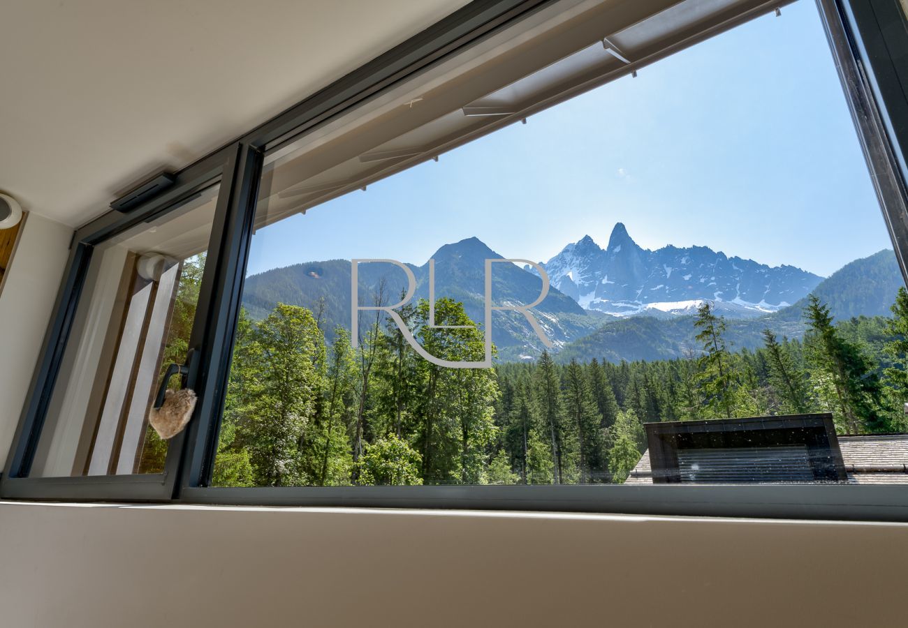 There is a stunning view of les Drus from Bedroom 1 of Chalet Red Fox