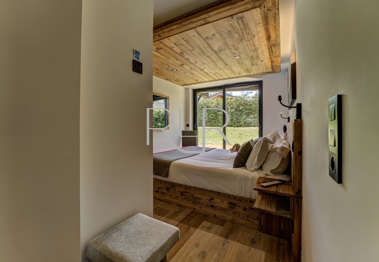 Bedroom 2 of Chalet Red Fox is a double room with an ensuite 