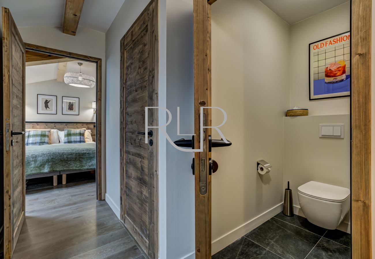 The upper floor hallway of White Pearl A32 has 2 shower rooms and a separate WC 