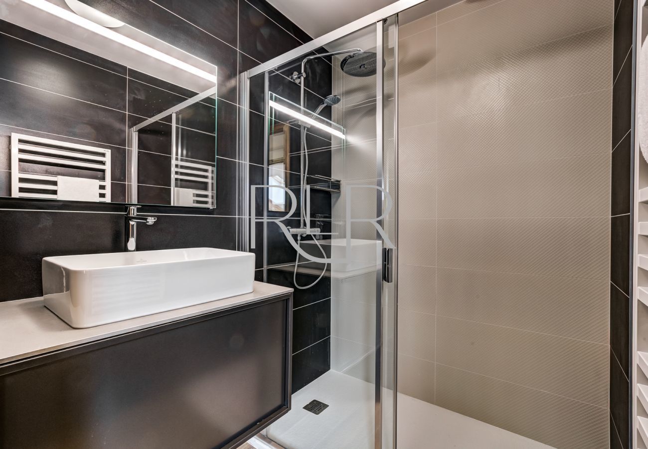 The upper floor hallway of White Pearl A32 has 2 shower rooms and a separate WC  