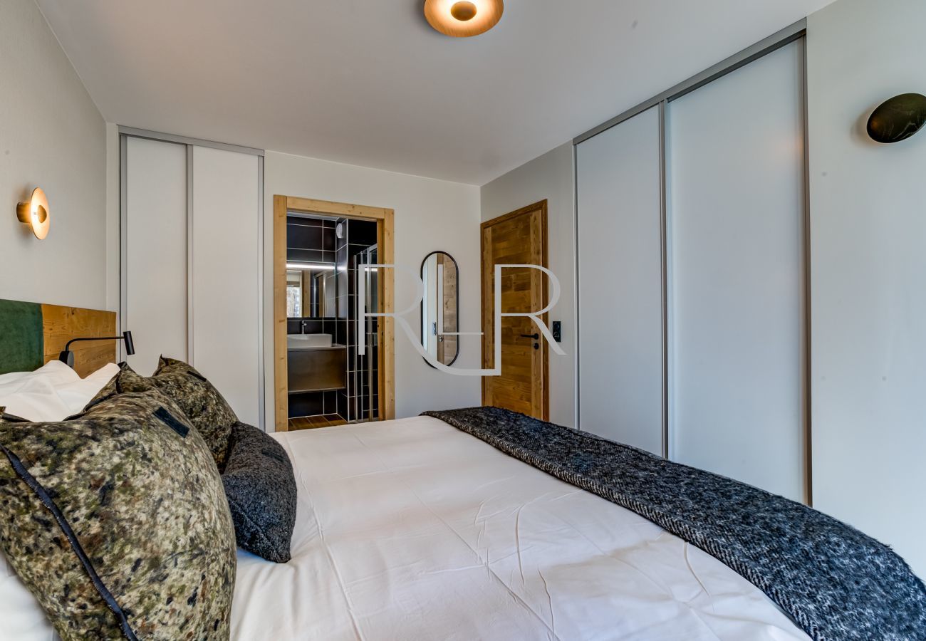 Bedroom 1 of White Pearl A12  is a double room with an ensuite and a balcony