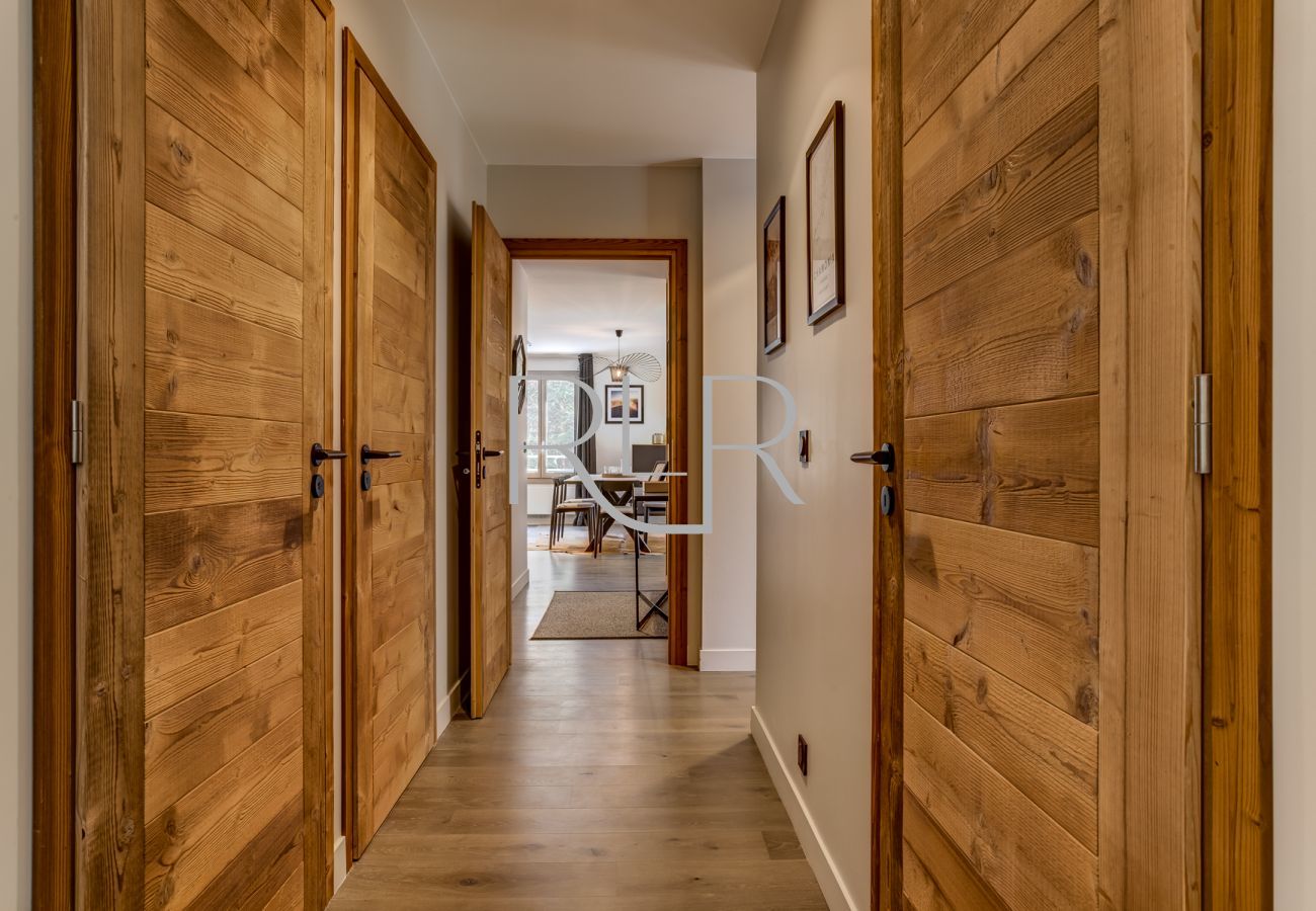 The hallway of White Pearl A12 leads to all the rooms