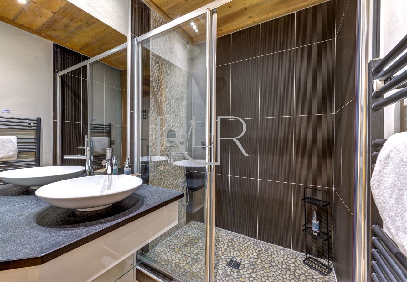 Blaitiere 2's Bedroom 1 has an ensuite with shower and basin.  