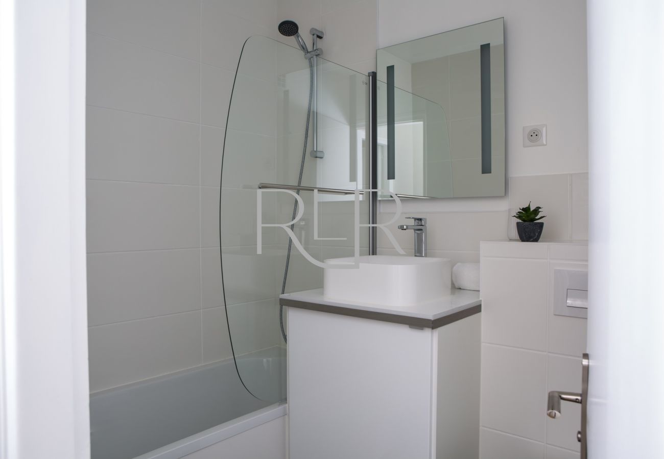 There is a bathroom adjacent to Bedroom 2 in Brevent 2