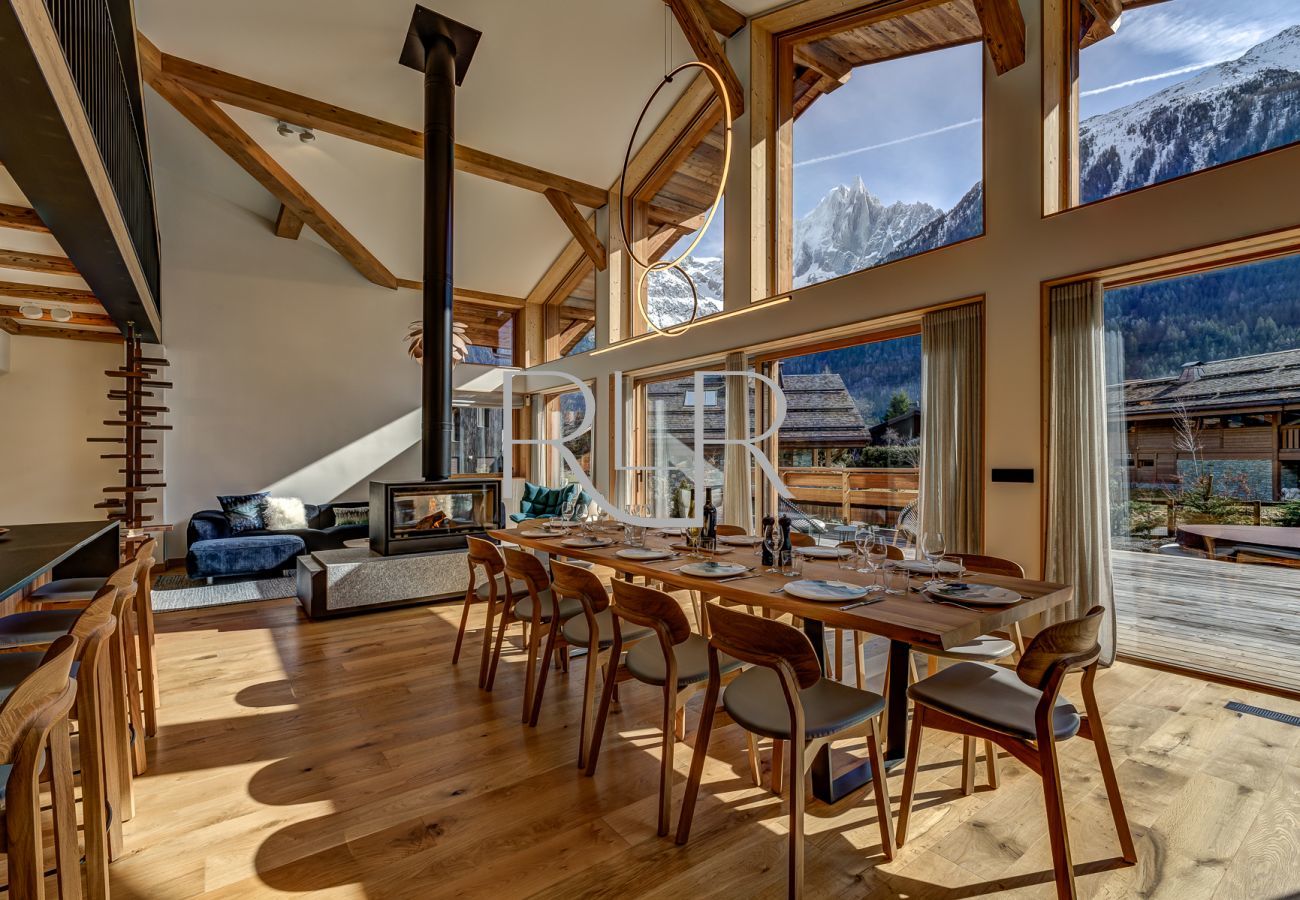 Chalet les Trois Soeurs has glass sliding doors onto the deck and garden  