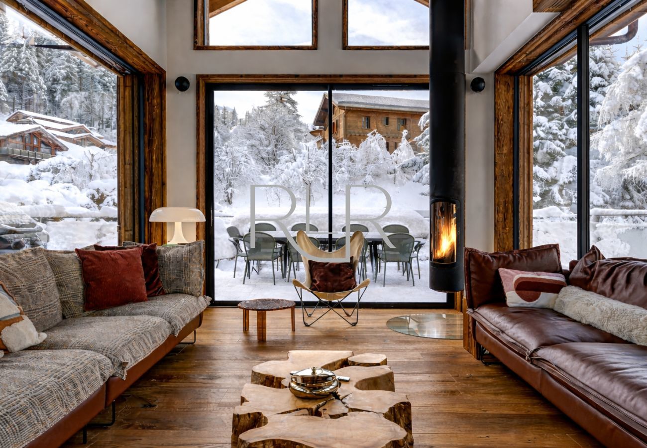 Chalet les Côtés du Lavancher has large sofas and a log burner.